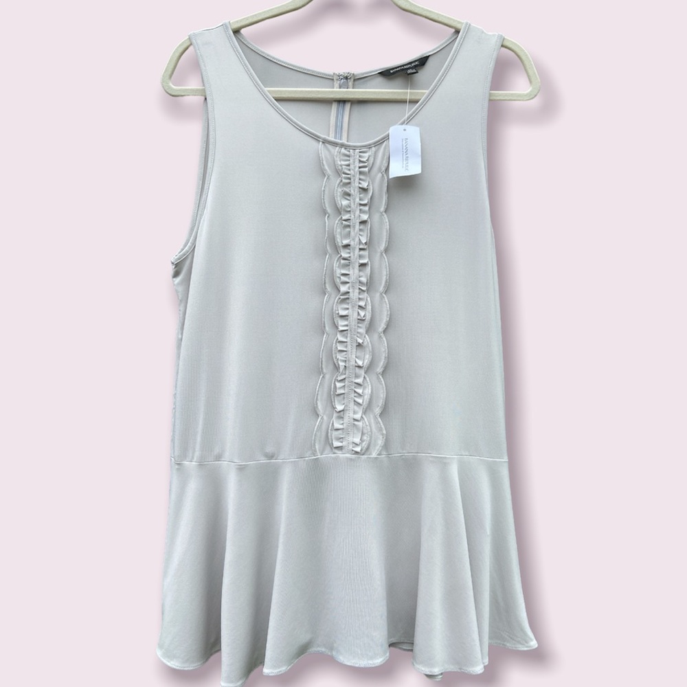 Banana Republic sleeveless peplum top. Size M. New